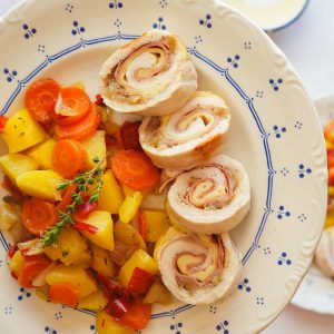 Turkey ballotines with green peppercorn, potatoes and tender vegetables